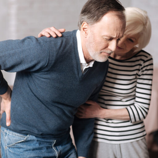 Senior man with terrible backache learning about how to increase quality of life