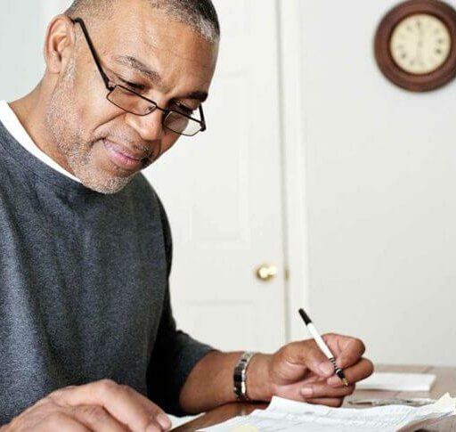 A man sets his budget for retirement.