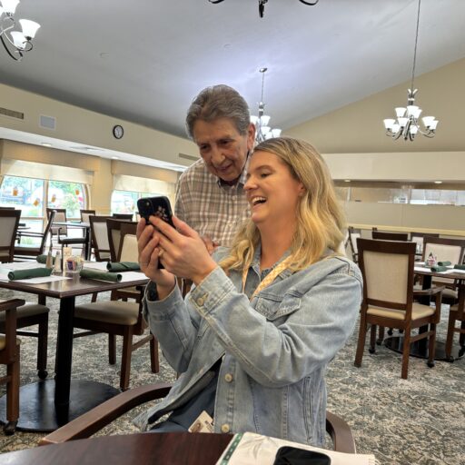 Ashley Nelson and Jo Manion view a TikTok video