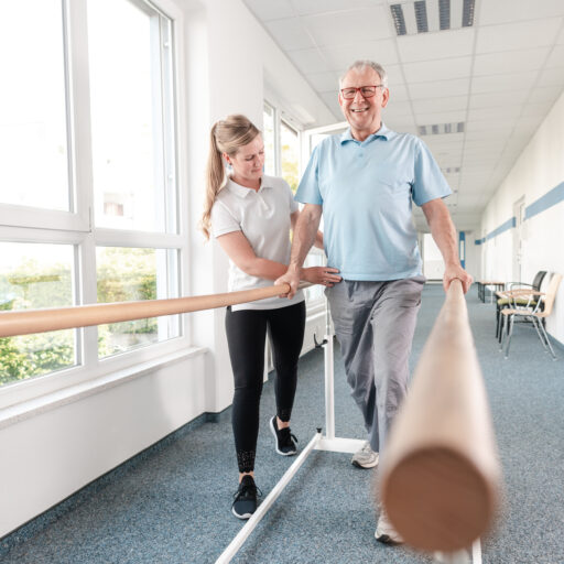 Senior man walking up ramp at senior rehabilitation center