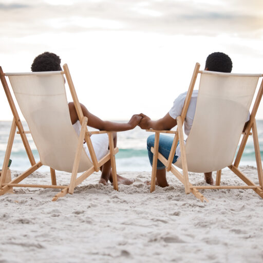 Adult couple on a caregiver vacation at the beach